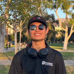Ethan Gamboa smiling and wearing an APSP polo