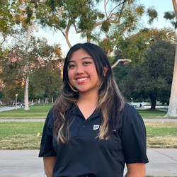 Kierstin Ramos smiling and wearing an APSP polo