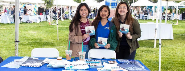 APSP Students Working Booth Event