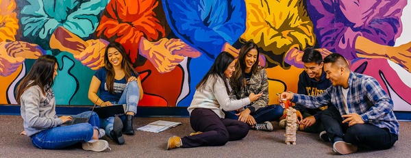 APSP Students Hanging Out in Front of Mural