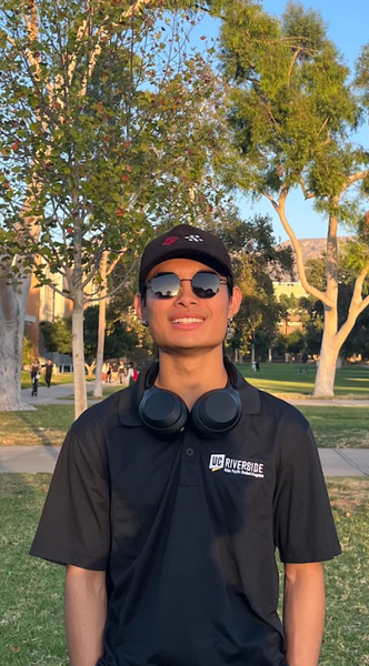 Ethan Gamboa smiling and wearing an APSP polo