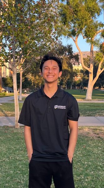 Kaleb Jones smiling and wearing an APSP polo